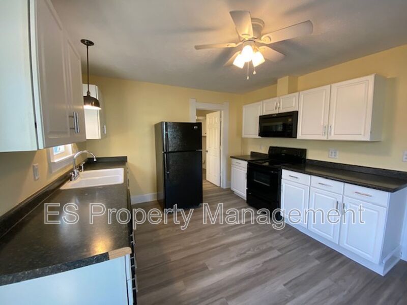 COMING SOON!! Charming Fountain Square victorian cottage w/ white picket fence! property image