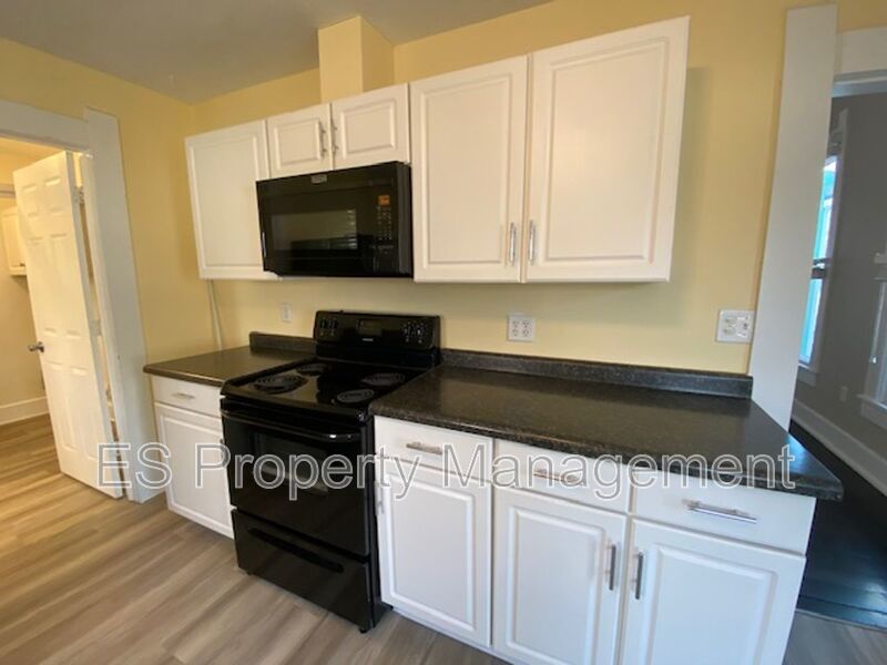 COMING SOON!! Charming Fountain Square victorian cottage w/ white picket fence! property image