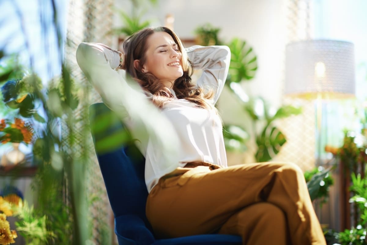 A person relaxing sitting in a chair, property management Indianapolis concept