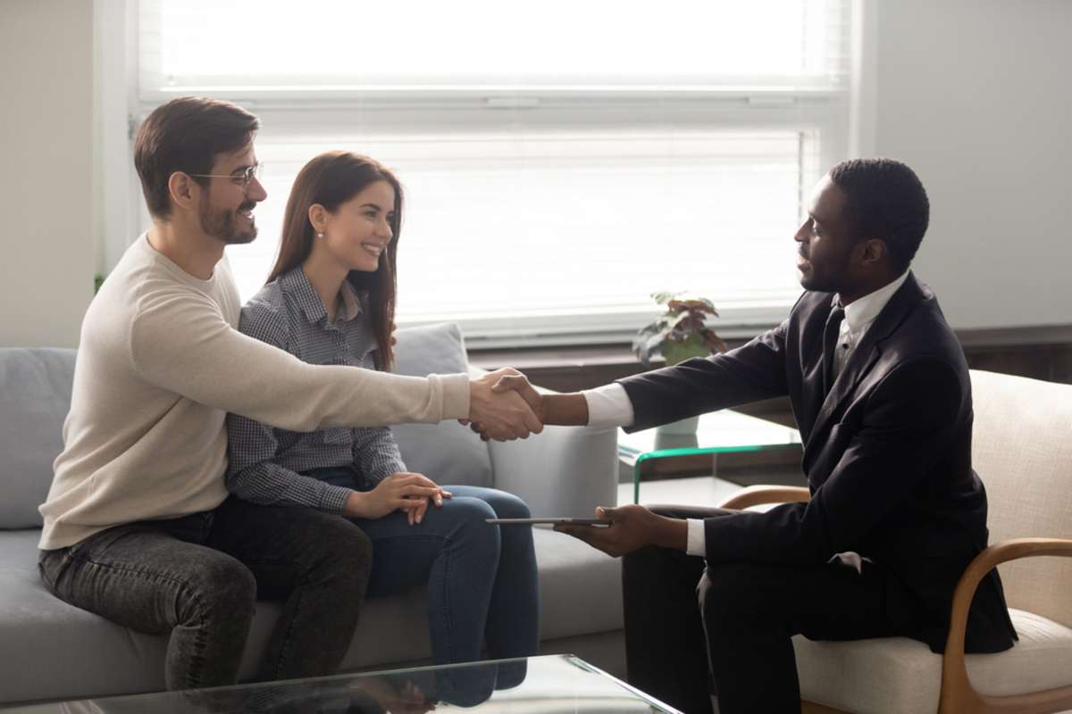 A qualified property management expert meets with tenants