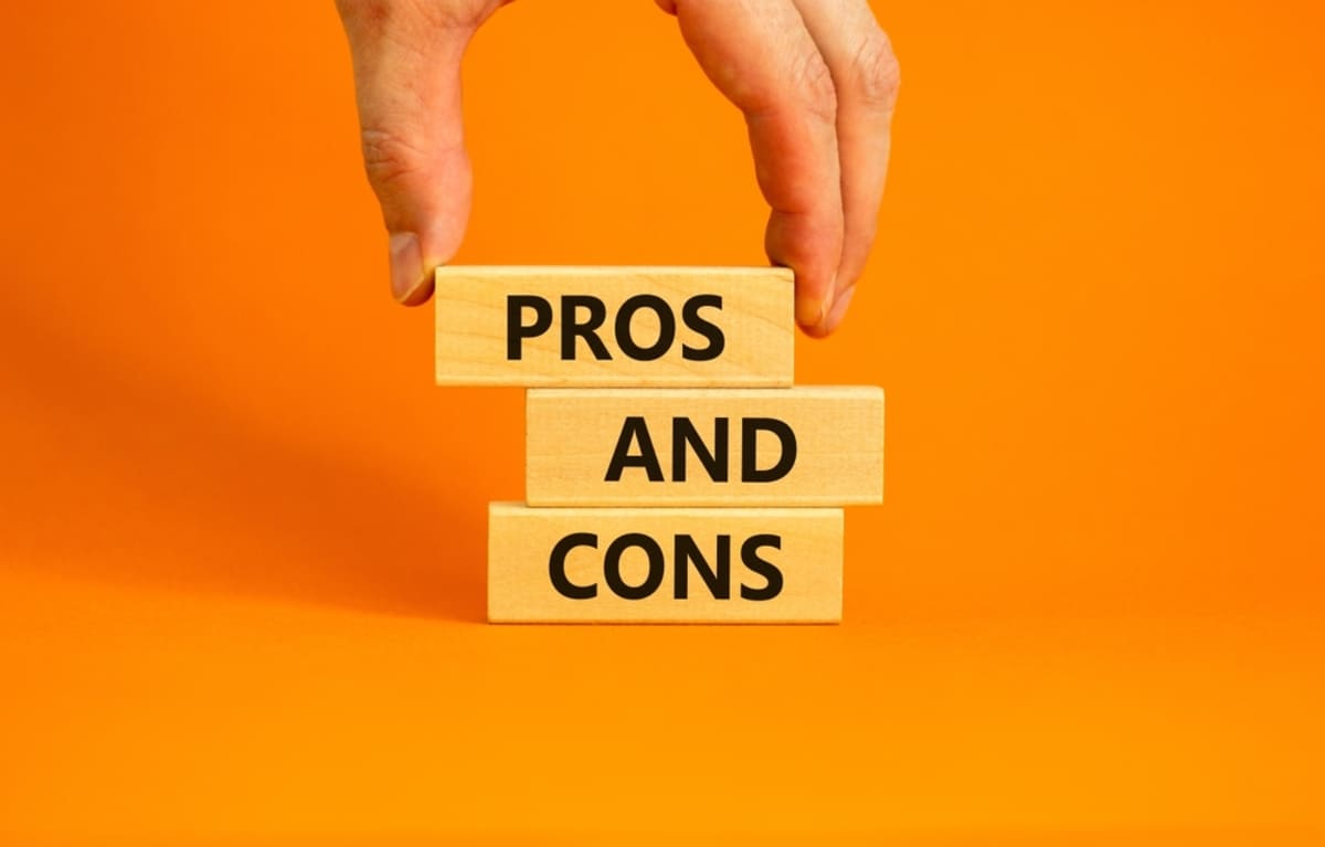 Wooden blocks stacked on top of each other that say pros and cons